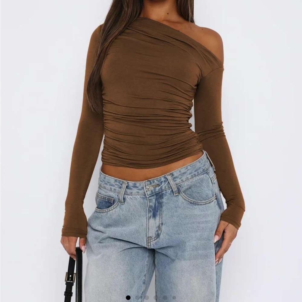 Never worn top asymmetrical neckline
